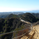 The towers of LA’s Westside are seen in the distance with the Pacific Ocean to the right
